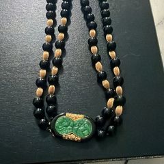 14k gold and curved jade with diamond necklace