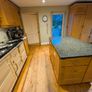 Solid wood kitchen with granite island Image 2