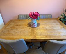Solid oak dining table and chairs