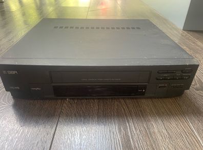 VCR, TV stand, computer screen
