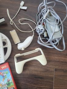 Nintendo wii console  + super Mario Bros wii