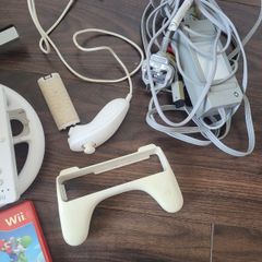 Nintendo wii console  + super Mario Bros wii