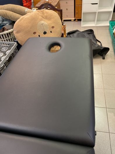 Massage table
