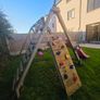 Wooden climbing frame with slide and swings Image 2