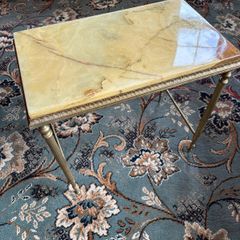 Antique style brass table with Onyx table top