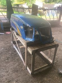 New Holland bonnet T6030 damaged on front corner