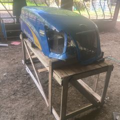 New Holland bonnet T6030 damaged on front corner