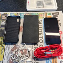 Iphone X 64GB with 2 cases, headphones and charging cable