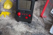 hand held retro arcade game