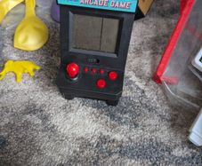hand held retro arcade game