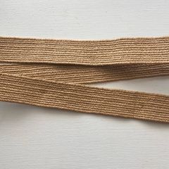 A women's beige straw woven belt features a square wooden pin buckle
