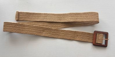 A women's beige straw woven belt features a square wooden pin buckle