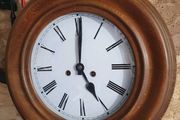 Vintage circular European wooden clock