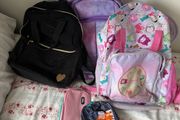 3 school bags and 2 pencil cases