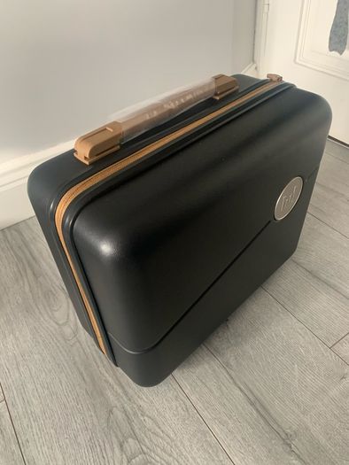 Classy carry-on luggage with ByteDance logo
