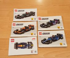 instruction booklets for five different LEGO Speed Champions Formula 1  race car building sets