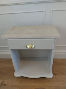 2 marbled top cabinets