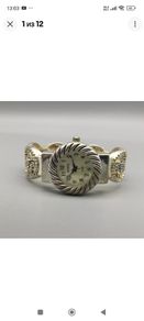 Geneva Women's Silver Tone Religious Open Cuff Bracelet Watch.