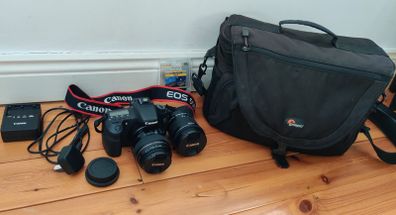 Canon 60d with 10-18 and 85 1.8 lenses, Lowepro bag and lots of extras