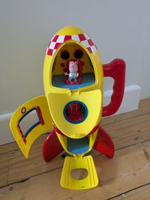 George pig astronaut figurine and rocket