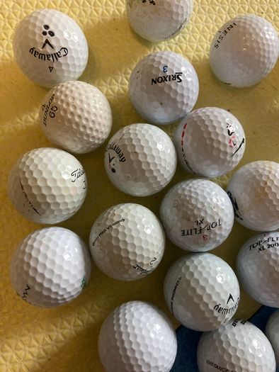 23 Mixed brand golf balls