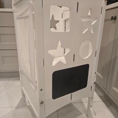 White wooden toddler learning tower