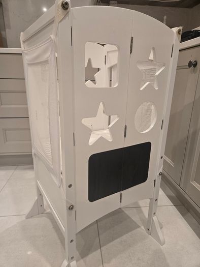 White wooden toddler learning tower