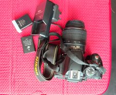 Nikon D5100 DSLR camera with 18-55mm / 50mm / 55-300mm lenses