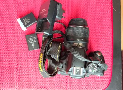 Nikon D5100 with 18-55mm / 50mm / 55-300mm lenses