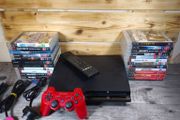 playstation 3 slim 120gb plus 23 games