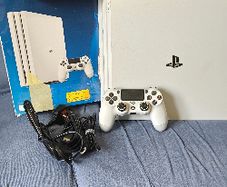 Stunning White PS4 Pro Bundle - 2 Controllers & Charging Dock!