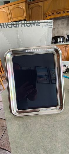 Frame marked BJF with a model number or code EPNS, 7 x 9.5 inhes