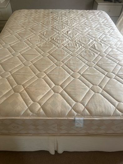 King size bed with optional mattress included.