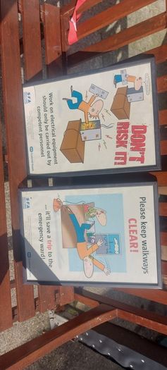 2 x framed safety pictures for ESB illustrated images,,,buyer collects, nice for any advertising wall display,,one glass broke on one picture,but can be easy replace ,,sold as seen,I reckon 80s 90s