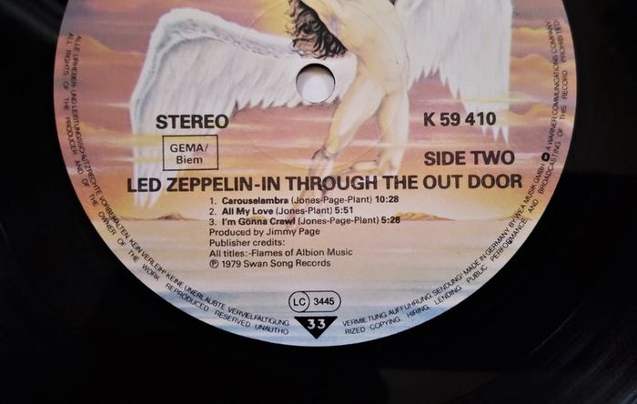 Lp.Led Zeppelin ''In Through The Out Door''Swang Song Rec.P-79.Cover Variant A. Ex/Nm.cond.