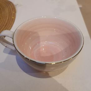 Beautiful small pink cup with gold rim