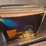Box of Vinyl , mostly scratched , sleeves could be used for art project or decoraration Image 7