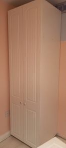 1 white wardrobe, over double bed press