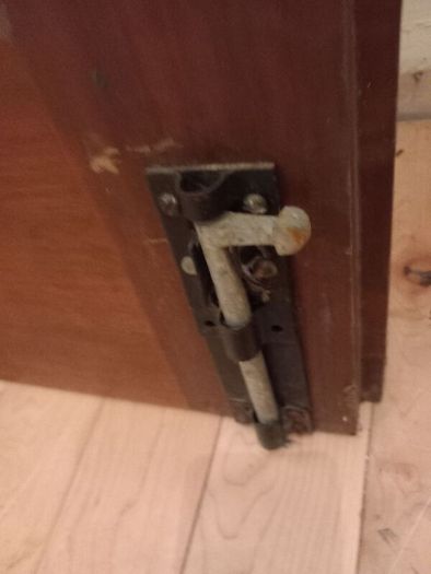 solid teak door with bolt