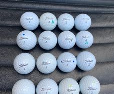 (16) High grade Tiltiest Pro V1  golf balls