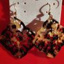 Arabesque earrings with a filigree pattern under the tortoise shell. Image 3