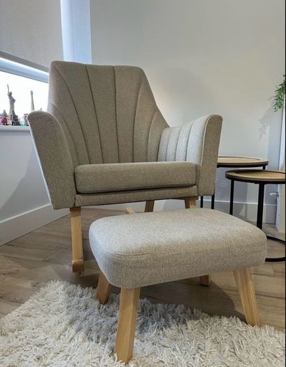 Nursery arm chair with foot stool