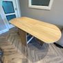 Oak dining table with drop leaf sides Image 3