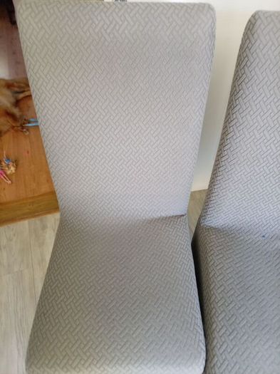 2 cream kitchen chairs with covers