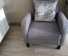 Grey armchair with 2 stools