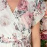 White pleated dress with large flowers Image 5