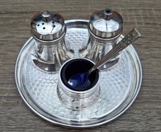 4 piece silver plated salt and pepper with mustard dispensers.