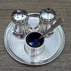 4 piece silver plated salt and pepper with mustard dispensers.