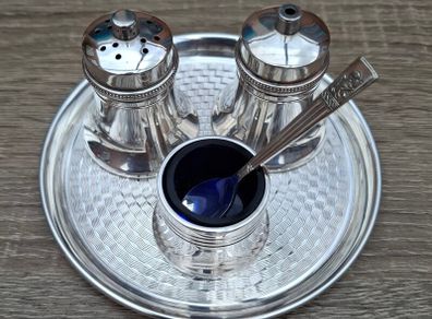 4 piece silver plated salt and pepper with mustard dispensers.