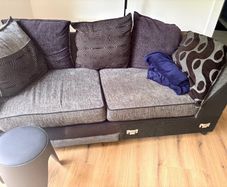 corner sofa and glass coffee table few years still left in it